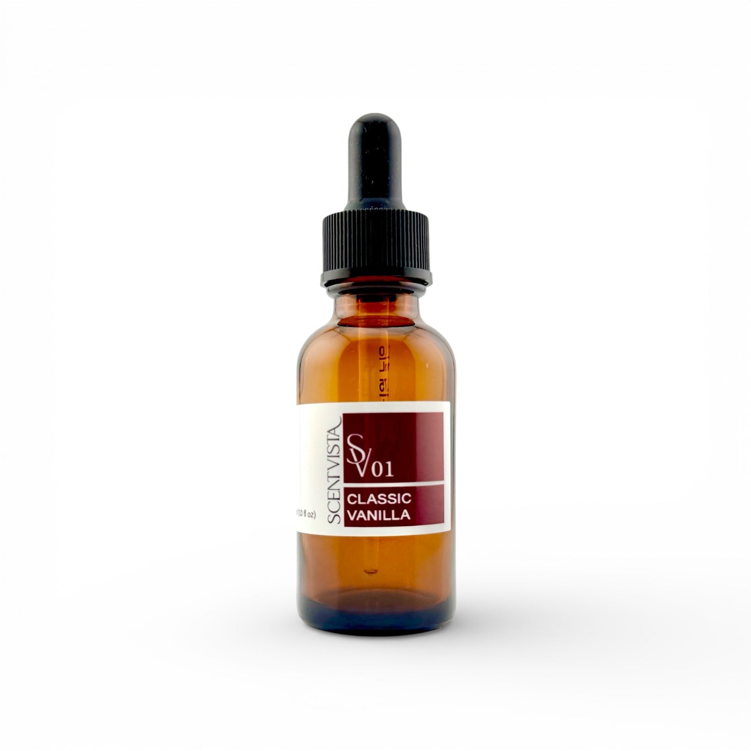 Amber glass bottle with dropper used to make custom perfumes and colognes on a white background