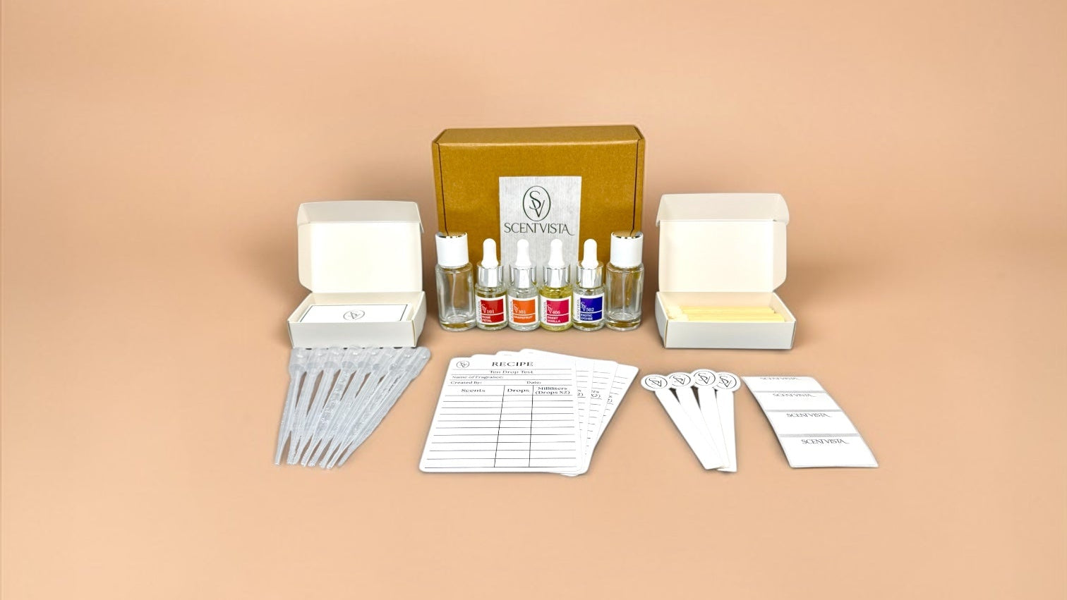 DIY Fragrance Kit for making custom perfumes and colognes on a beige background