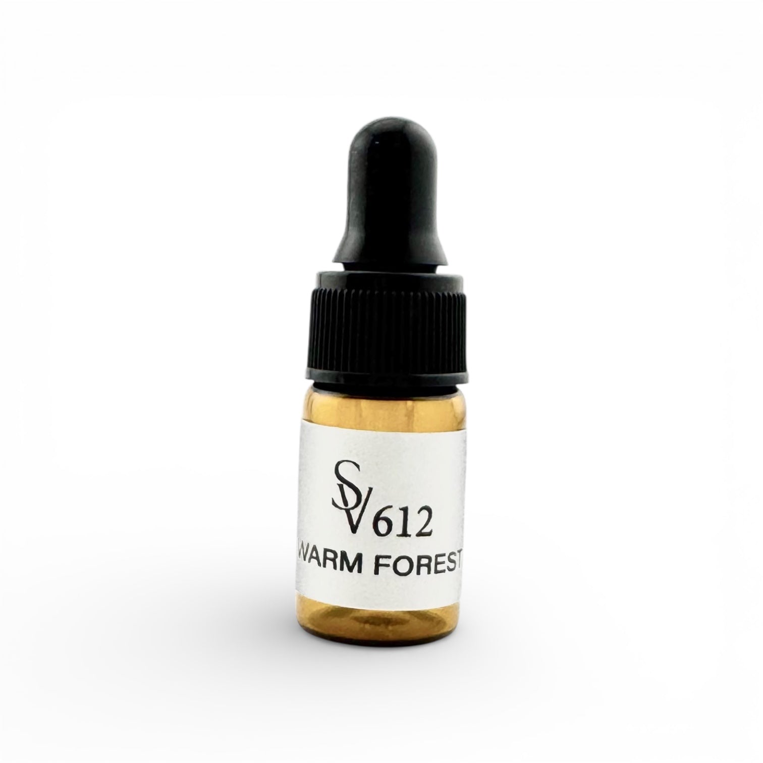 Bottle of SV612 Warm Forest oil with a dropper on a white background